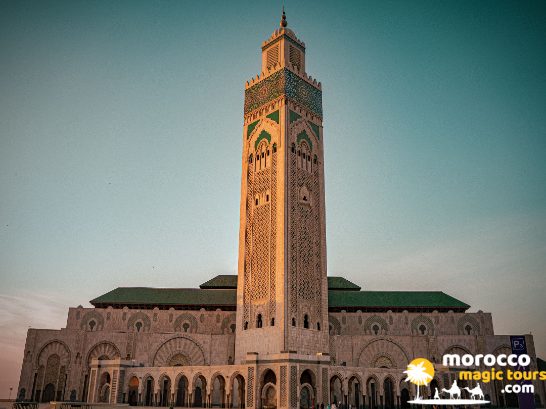 Grand minaret of Hassan II Mosque on the Casablanca coast for 9 days in Morocco tour