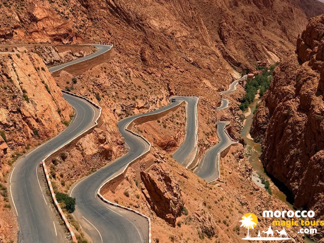 Premium 5 day desert tour from marrakech Winding mountain pass roads cut through giant red canyons in the Dades Gorges.